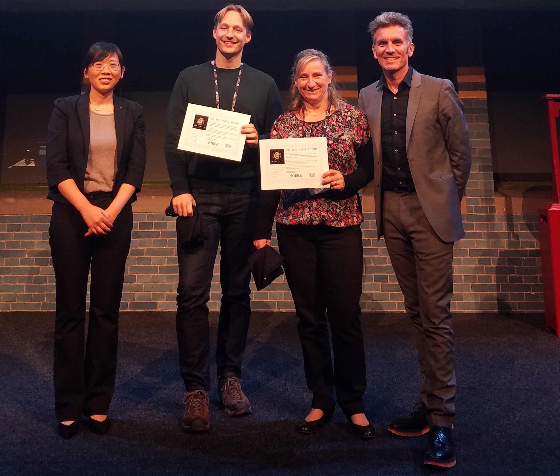 Award ceremony at WHISPERS 2018 with (left to right) X. Zu, R. Milewski, S. Chabrillat, J. Chanussot (image courtesy WHISPERS 2018)